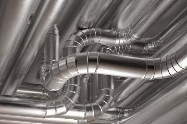 Metallic HVAC pipes along with roof